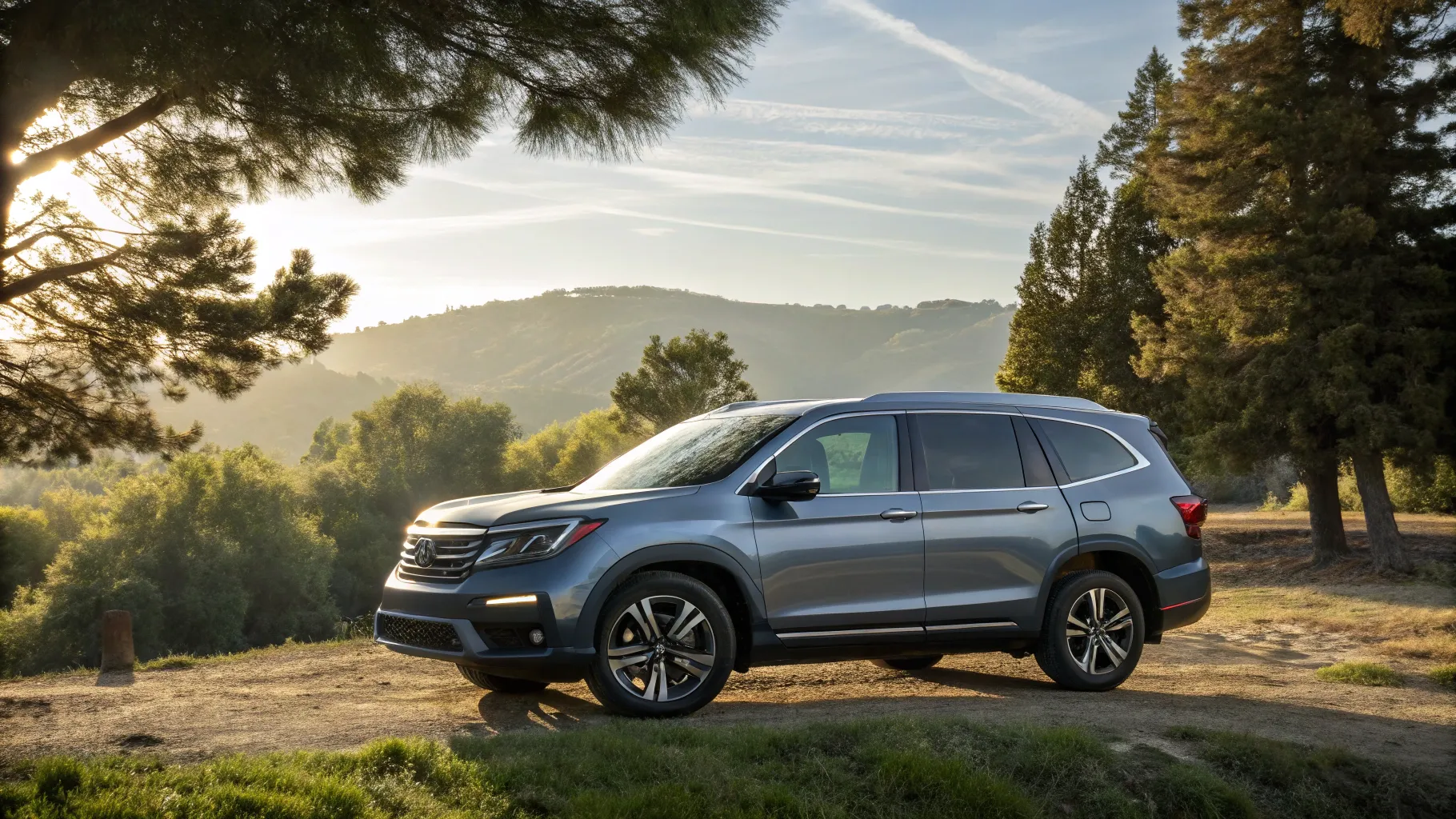 Used Honda Pilot for Sale parked amidst nature, emphasizing its sleek design and spaciousness.