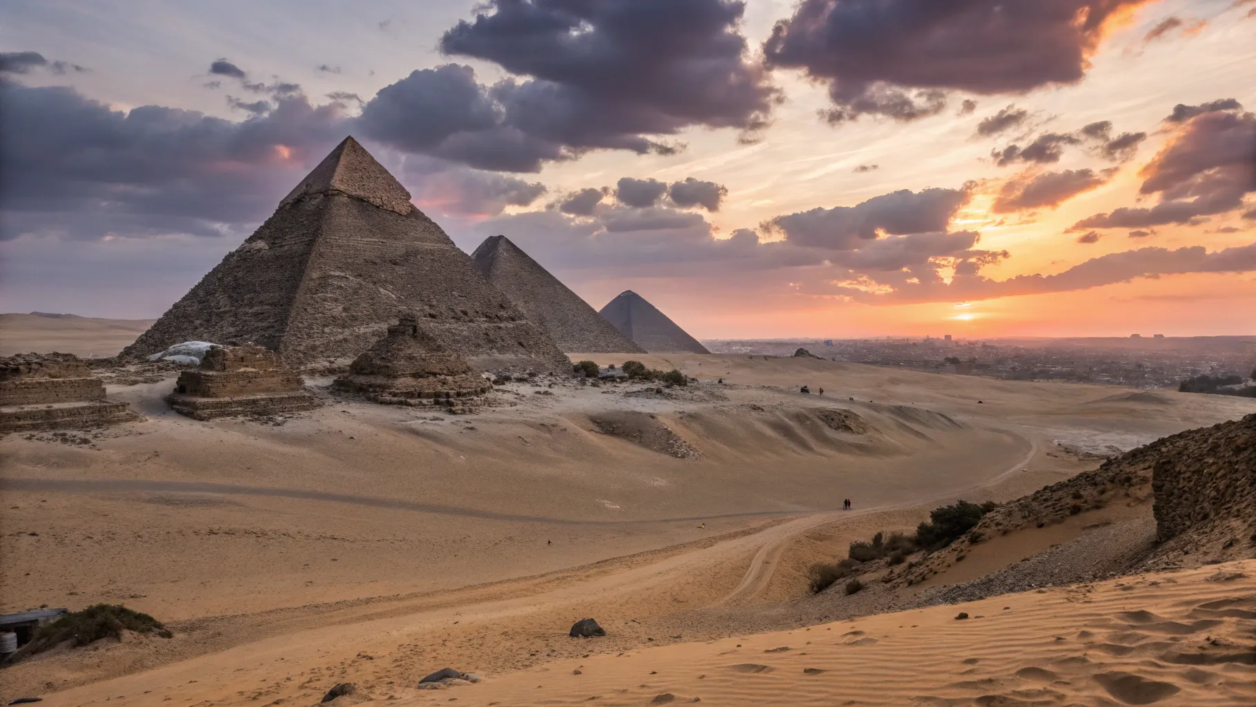 12 Days in Egypt Tour Packages view of the Great Pyramids at sunset with warm colors.