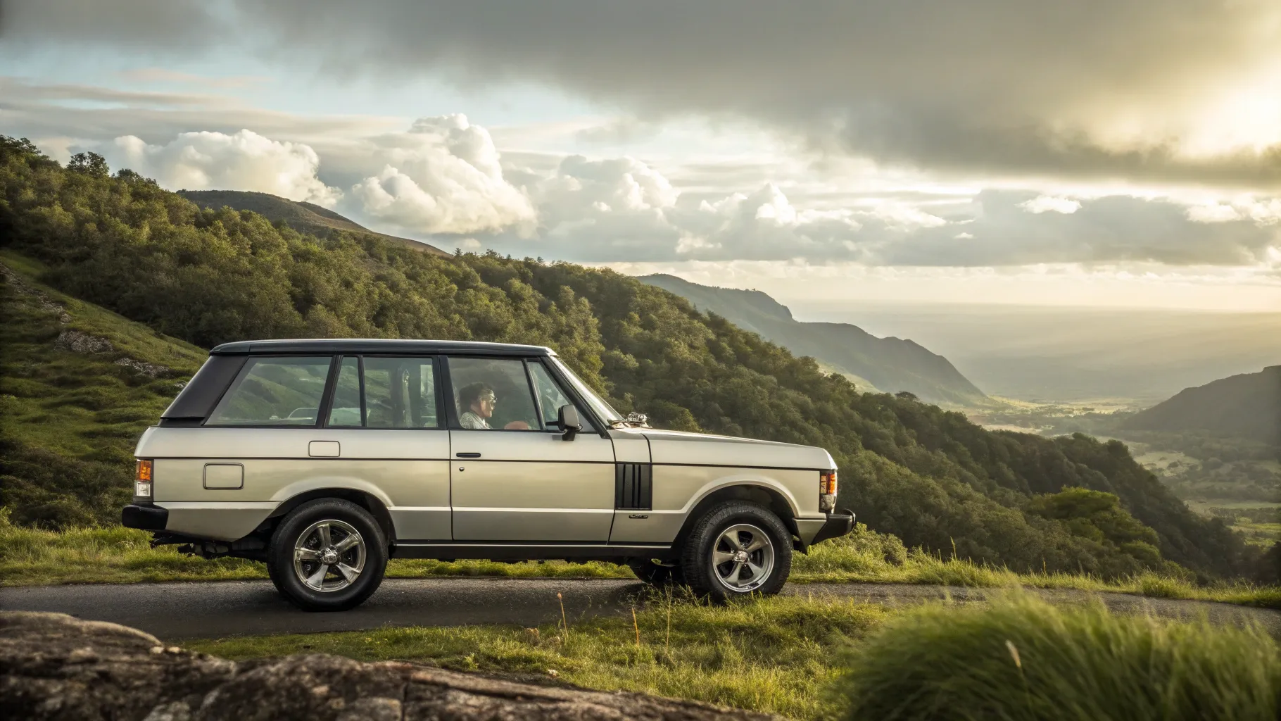 Range Rover Models of All Time displayed against a beautiful outdoor backdrop.