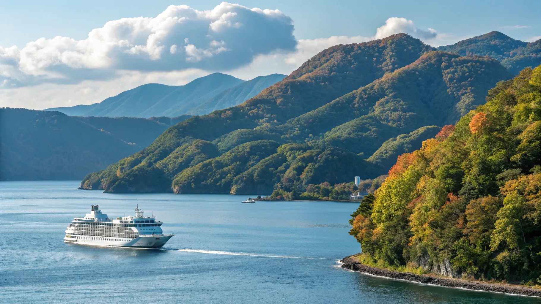 日本からのシニア向けクルーズ人気トップ5行き先 A serene cruise ship view near Hokkaido.